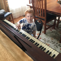 Brooks Playing Piano